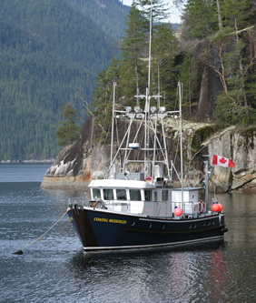 Coastal Messenger tied to mooring buoy in Desolation Sound.